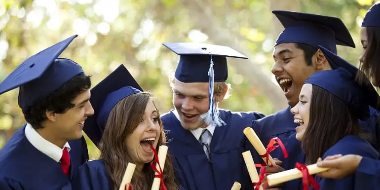 Group of Graduates with Diplomas